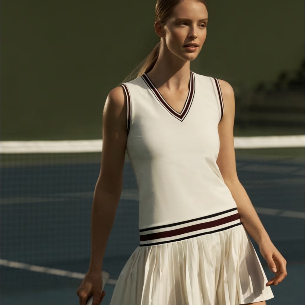 Tory Burch Tennis Dress - size S 
Cute dress on and off court !